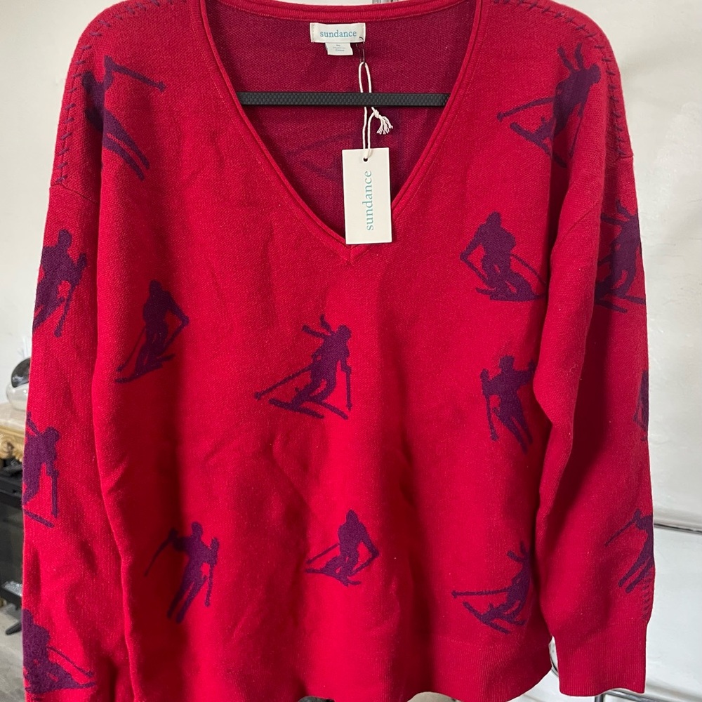 Sundance Red V-Neck Sweater with Playful Design
